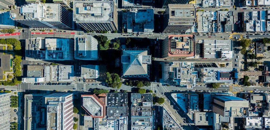 Aerial overhead shot of densely-built urban space