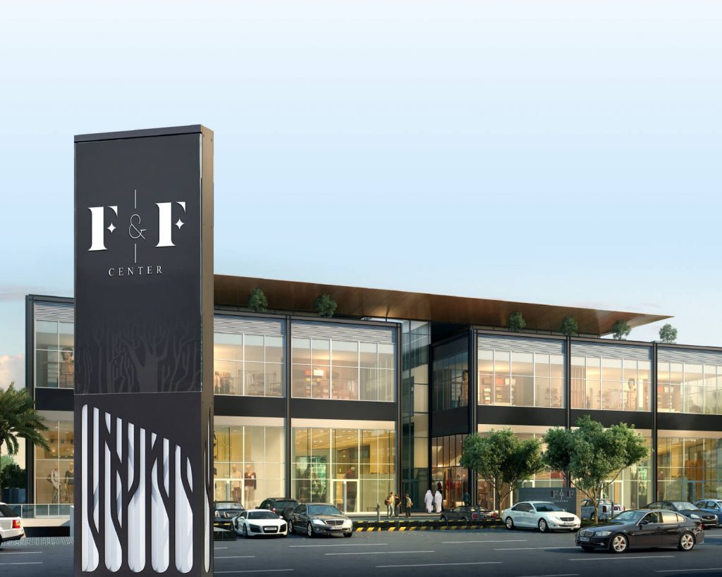 F&F Centre (Riyadh, Saudi Arabia) branding totem in the foreground with modern shopping development in the background.