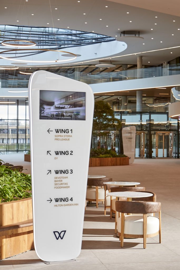 Example of monolith wayfinding signage for The Wings, Belgium, designed by Signburo.