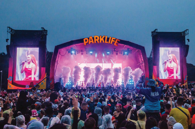 View of the main stage of PARKLIFE Festival (Manchester) showcasing branding signage by Allen Signs / Applelec