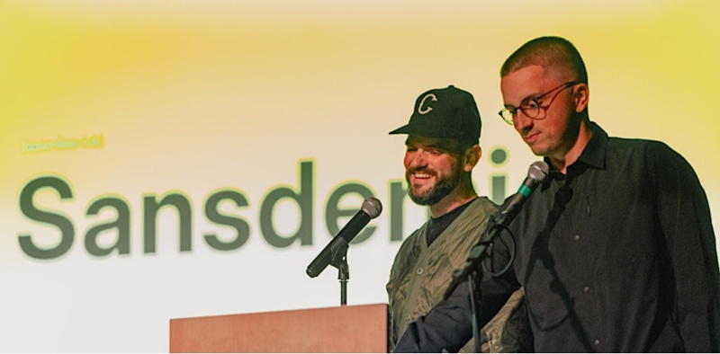 Studio DRAMA’s founders Chris and William talking at an event