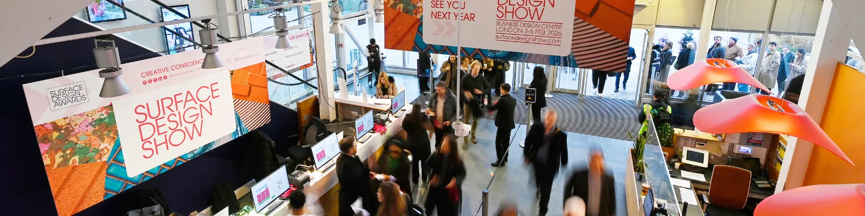 Internal photo of delegates arriving for the Surface Design Show